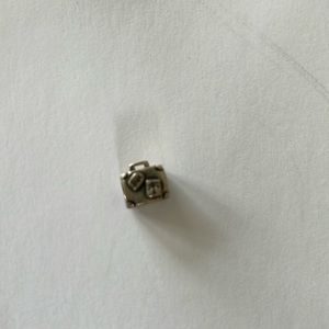 Sterling silver bead suitcase, Paris on one side and a palm tree on the other